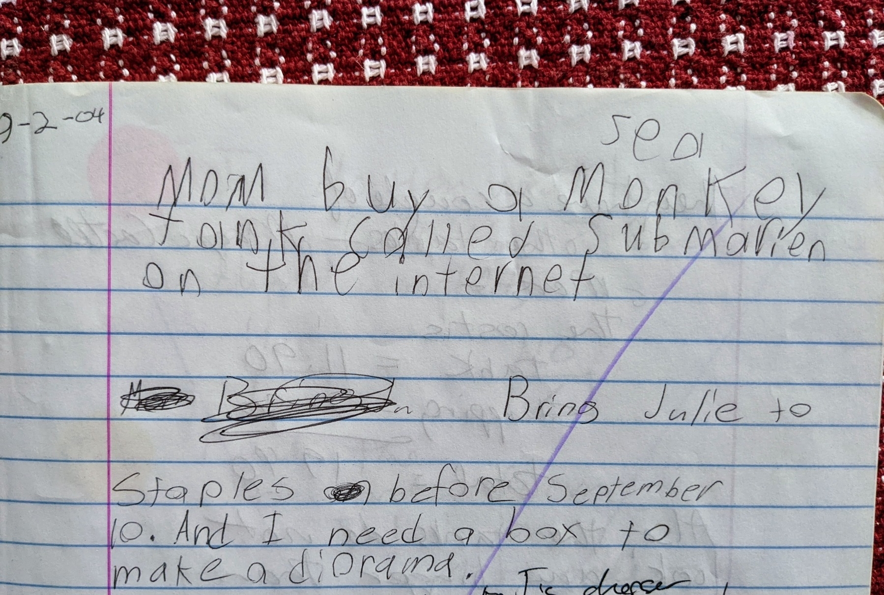 notebook page in a child's handwriting saying, Mom, buy a sea monkey tank called submarine on the internet